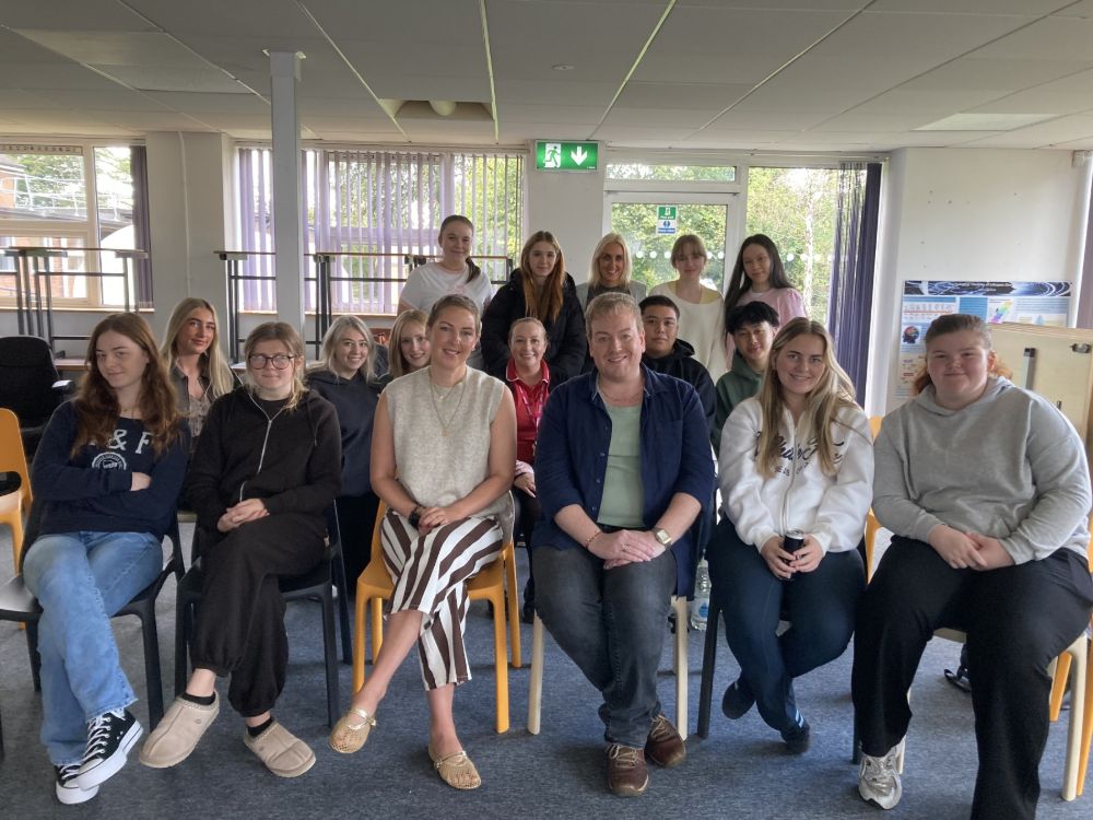 Claire Haire with students and staff from SERC